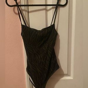 Black body suit, dark green striped detailing